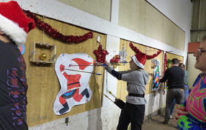 Une animation de Noël autour du tir à l'arc dans la joie et ... la gourmandise !